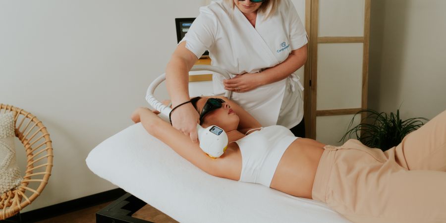 Corpoderm technician working on devices